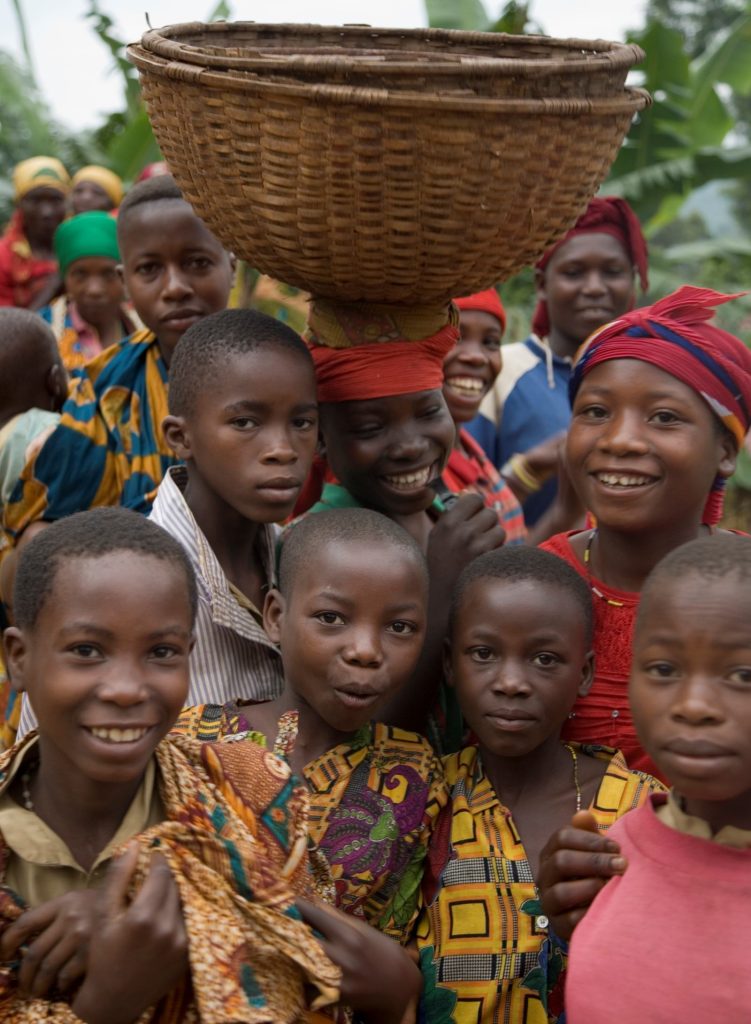 A group of happy children with one carrying a larg 2026 01 09 09 09 33 utc